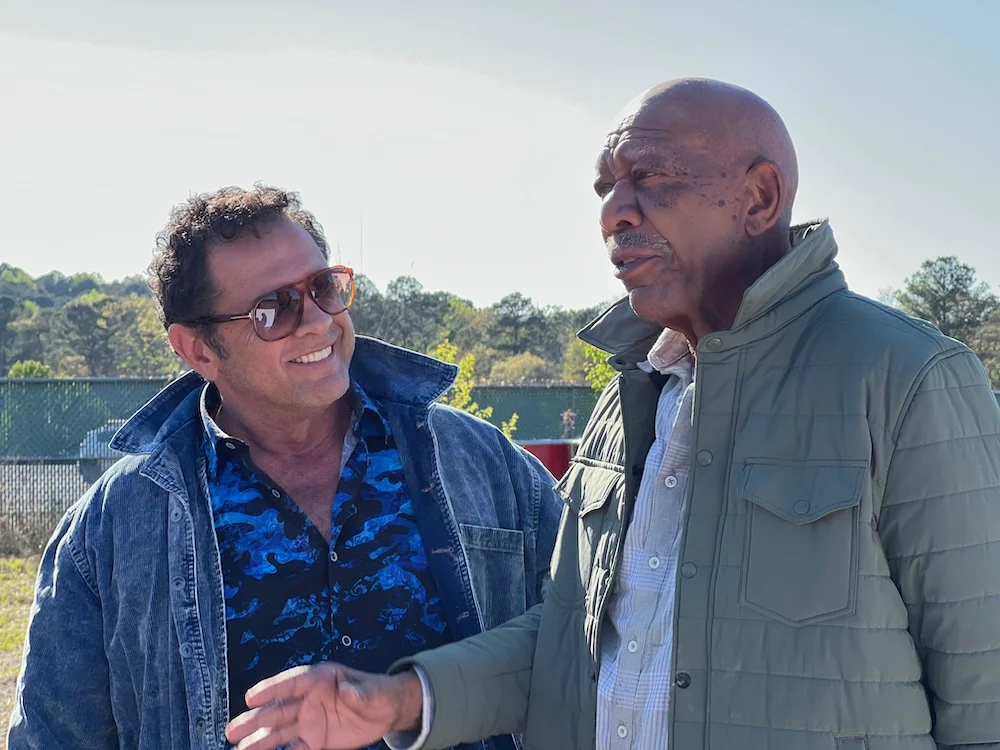 Dimitri Logothetis and Morgan Freeman on set
